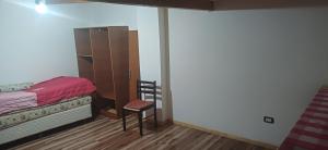 En eller flere senge i et værelse på HabitacionTemporal1