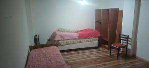 En eller flere senge i et værelse på HabitacionTemporal1