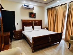 Postel nebo postele na pokoji v ubytování Irha's Living