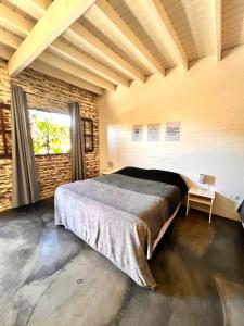 Una cama o camas en una habitación de Alma Pura