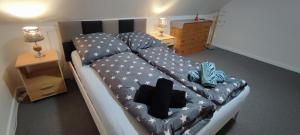 Ένα ή περισσότερα κρεβάτια σε δωμάτιο στο Gemütliches Gästezimmer in Flensburg-Weiche