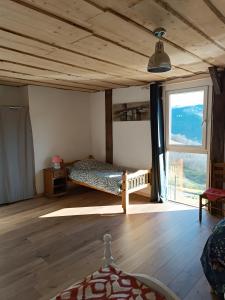 En eller flere senge i et værelse på Chez Jf et Isa