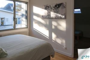 En eller flere senge i et værelse på Villa Jules Grand Gîte + 18 billeder