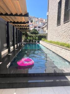 Bazén v ubytování Air Onia nebo v jeho okolí