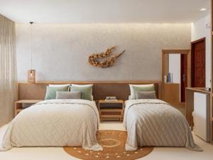 Ένα ή περισσότερα κρεβάτια σε δωμάτιο στο Villa Sol e Mar +4 φωτογραφίες