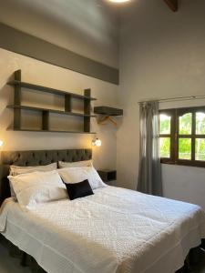 Ένα ή περισσότερα κρεβάτια σε δωμάτιο στο Apart y Suite Portal del Luz