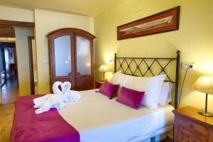 Ένα ή περισσότερα κρεβάτια σε δωμάτιο στο Hostal San Pedro