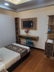 Postel nebo postele na pokoji v ubytování Hotel Casa Santiago + 7 fotografií