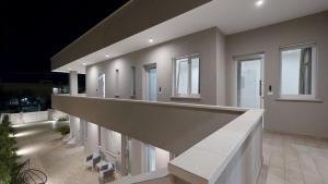 a large house with a balcony with windows at MarèA25 in Porto Cesareo +57 photos