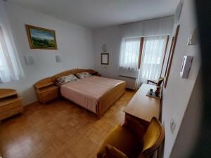 Ένα ή περισσότερα κρεβάτια σε δωμάτιο στο Cozy Nook Stays, Zreče