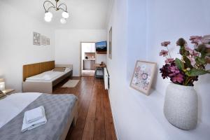 Postel nebo postele na pokoji v ubytování Penzion Crystal