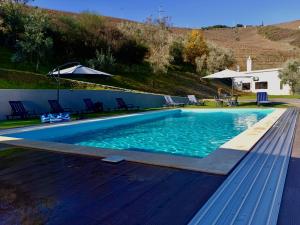 Bazén v ubytování Quinta Da Batoca nebo v jeho okolí