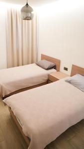 Postel nebo postele na pokoji v ubytování Freya apartments