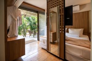 Postel nebo postele na pokoji v ubytování Duke Beach Hotel Maresias