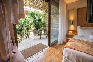 Postel nebo postele na pokoji v ubytování Duke Beach Hotel Maresias