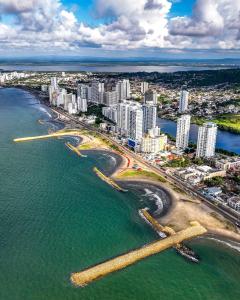 an aerial view of a beach with buildings and the ocean at Apartaestudio Marbella #2-10 in Cartagena de Indias