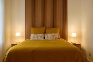 Ένα ή περισσότερα κρεβάτια σε δωμάτιο στο L'ELEGANT - TERRASSE PARKING WIFI - 5Km AIRPORT +51 φωτογραφίες