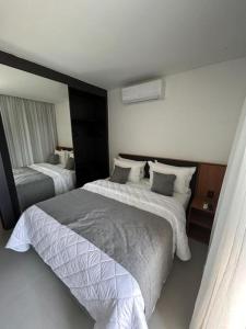 Postel nebo postele na pokoji v ubytování Resorts Porto Alto & Porto 2 Life