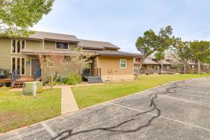 a house with a street in front of it at Modern Point Venture Vacation Rental w/ Deck! in Point Venture
