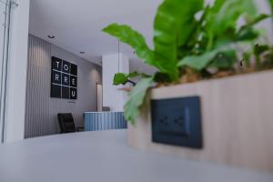 Μια τηλεόραση ή/και κέντρο ψυχαγωγίας στο Torre U kooliving