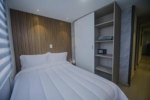 Ένα ή περισσότερα κρεβάτια σε δωμάτιο στο Torre U kooliving