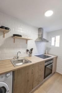 Kuchyň nebo kuchyňský kout v ubytování Encantador Apartamento de Lujo en Valencia 3 Dormitorios