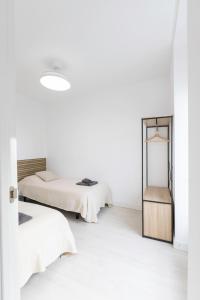 Postel nebo postele na pokoji v ubytování Encantador Apartamento de Lujo en Valencia 3 Dormitorios