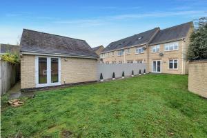 an empty yard in front of a house at Modern 3 BR House near Bicester Village in Bicester