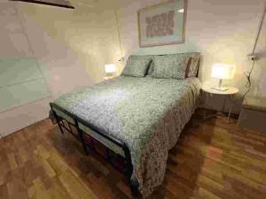 Ένα ή περισσότερα κρεβάτια σε δωμάτιο στο Civico46