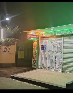 a building with a gate in front of it at Homebase gardens guesthouse in Nakuru