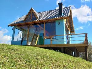 a house on top of a hill at Cabana com Hydro, Recanto das Trutas, SC in Bocaina do Sul