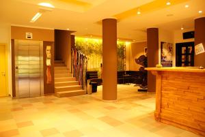 a lobby with a staircase and a hallway with a lobby at Apartman Foka Spa in Brzeće +23 photos