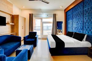 Ένα ή περισσότερα κρεβάτια σε δωμάτιο στο Hotel O DUNARA