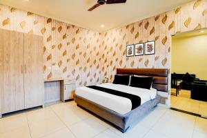 Ένα ή περισσότερα κρεβάτια σε δωμάτιο στο Hotel O DUNARA