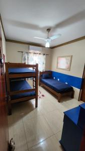 Ένα ή περισσότερα κρεβάτια σε δωμάτιο στο Pousada da Lua Barretos