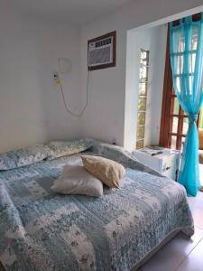 Giường trong phòng chung tại Sal Studio - Centro RJ