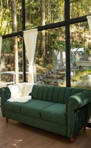 Et opholdsområde på Nido Glamping - Cabana Laguna