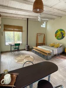 En eller flere senge i et værelse på Mini Loto