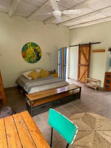 En eller flere senge i et værelse på Mini Loto