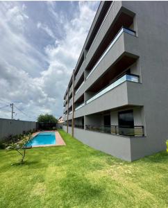 Bazén v ubytování Oásis Cumbuco Residence nebo v jeho okolí