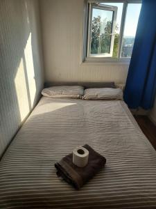 Postel nebo postele na pokoji v ubytování Guest Stay