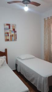 En eller flere senge i et værelse på Hostel Casa Azul + 11 billeder