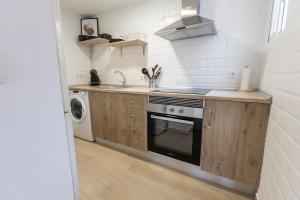 Kuchyň nebo kuchyňský kout v ubytování Encantador Apartamento de Lujo en Valencia 3 Dormitorios + 24 fotografií