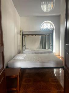 Ένα ή περισσότερα κρεβάτια σε δωμάτιο στο Apartamento La Casona