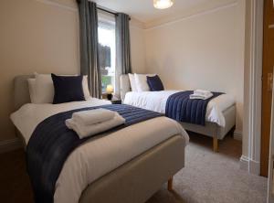 En eller flere senge i et værelse på Uachan