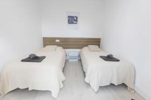 Postel nebo postele na pokoji v ubytování Encantador Apartamento de Lujo en Valencia 3 Dormitorios