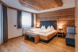 Postel nebo postele na pokoji v ubytování Gäste-Appartementhaus - Urlaubsresort Hafele