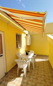 Balkón nebo terasa v ubytování Casa Vacanze Il Piccolo Viaggiatore