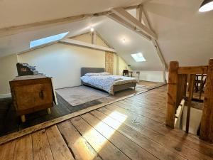 Кровать или кровати в номере A l'ombre de la Tour