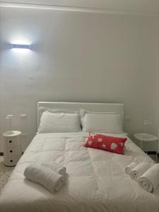 Giường trong phòng chung tại La Casa di Anna